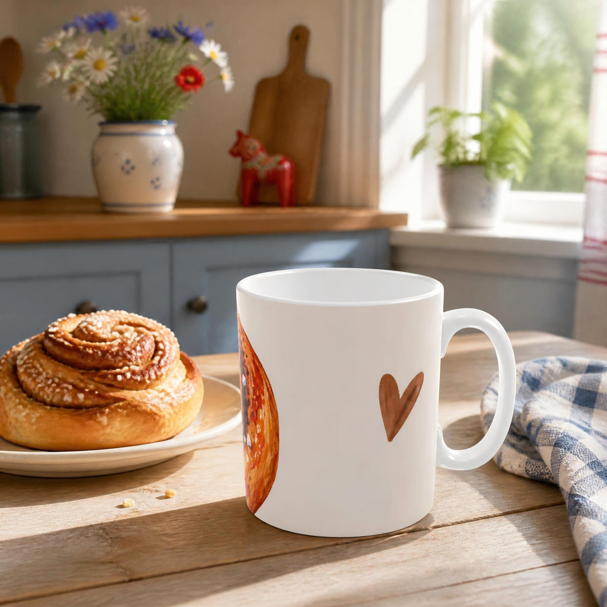 Kanelbulle Mug with Swedish cinnamon bun in a cosy fika setting